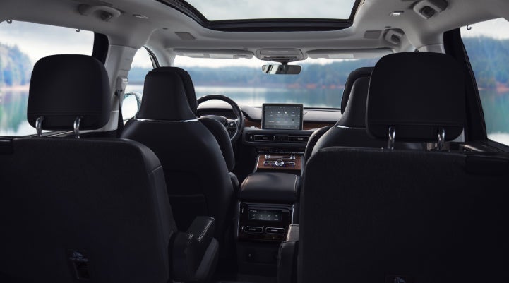 The interior of a 2024 Lincoln Aviator® SUV from behind the second row | Libertyville Lincoln Sales, Inc. in Libertyville IL