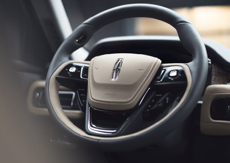The intuitively placed controls of the steering wheel on a 2024 Lincoln Aviator® SUV | Libertyville Lincoln Sales, Inc. in Libertyville IL